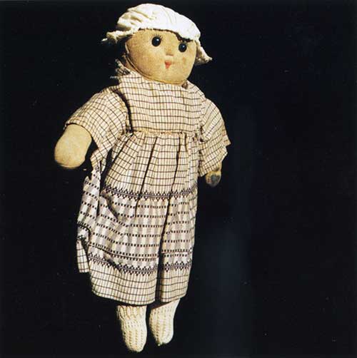 Photograph of a doll, from The Rotunda Museum, Scarborough